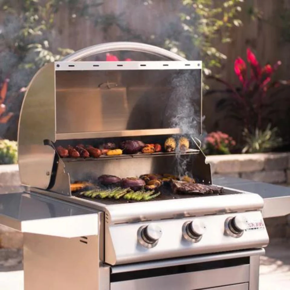 Grilling surface of Blaze Prelude LBM 25" Built-In 3-Burner Grill with lid open