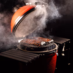 Kamado Joe Big Joe III Ceramic Kamado Grill — ribs smoking with steady blue smoke